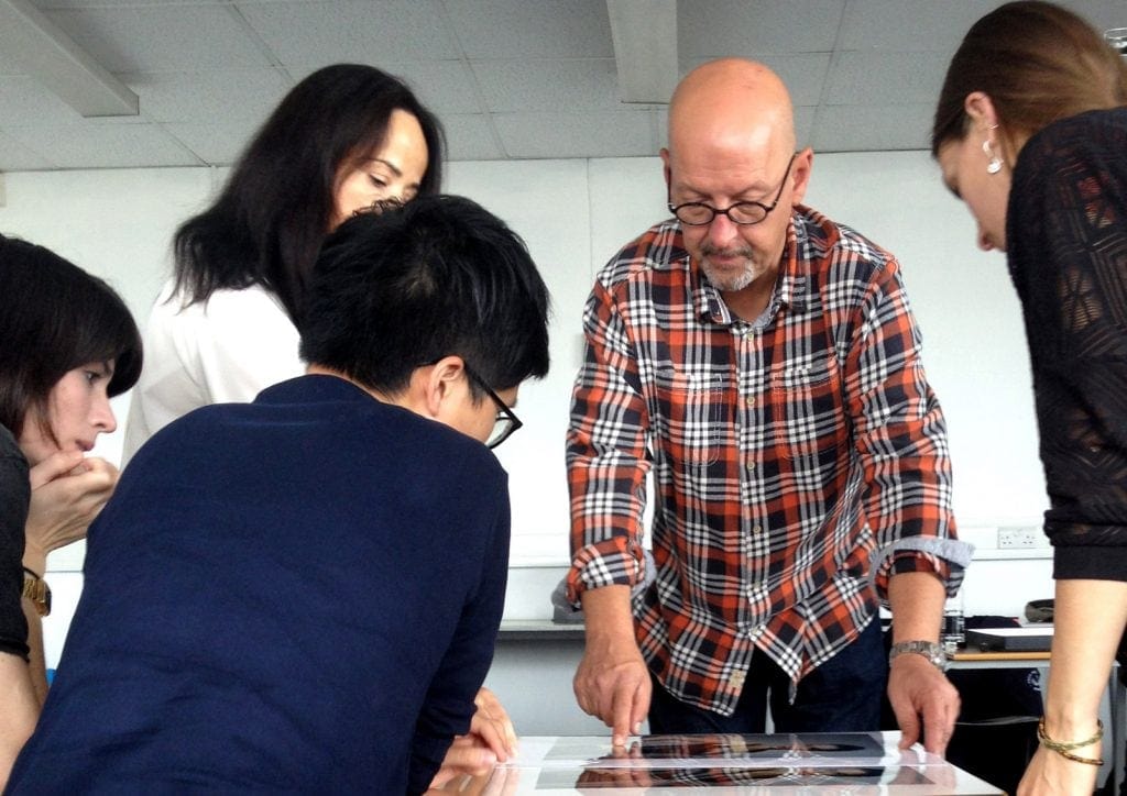 Our Creative Director Mark explaining printing services to MA photography students at London College of Communication